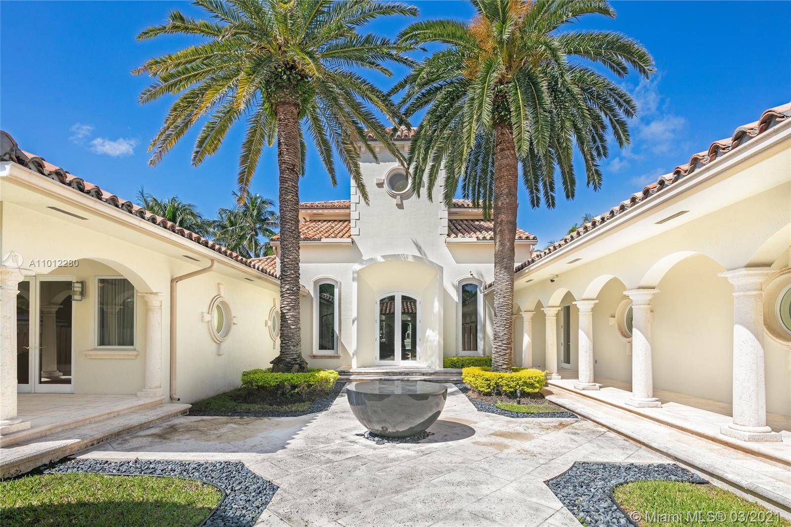 Beautifully Renovated Mediterranean home on prestigious Allison Island.