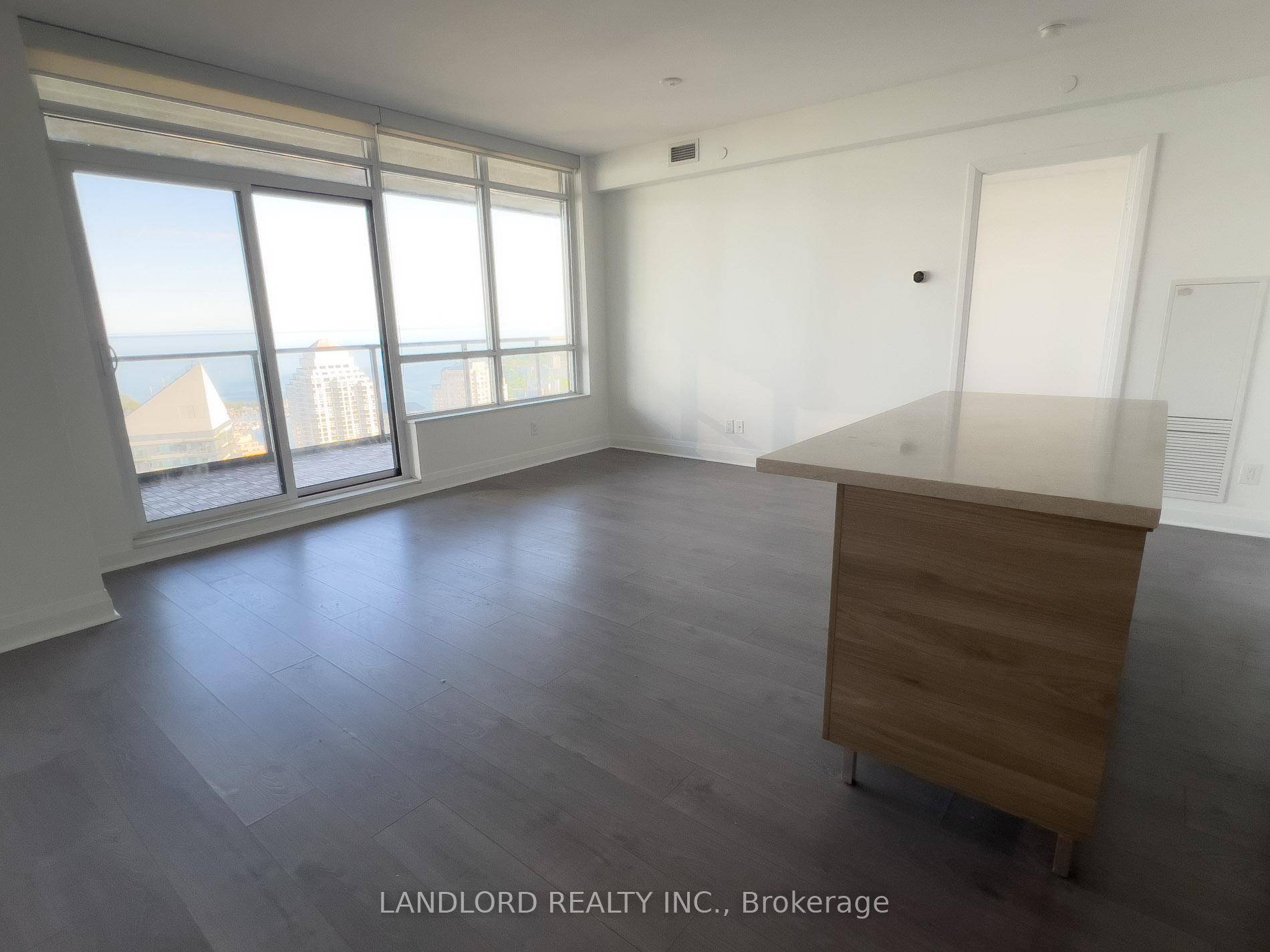 Vacant move in ready unfurnished 35th floor suite with sweeping views of Lake Ontario from a 180sqft corner balcony !