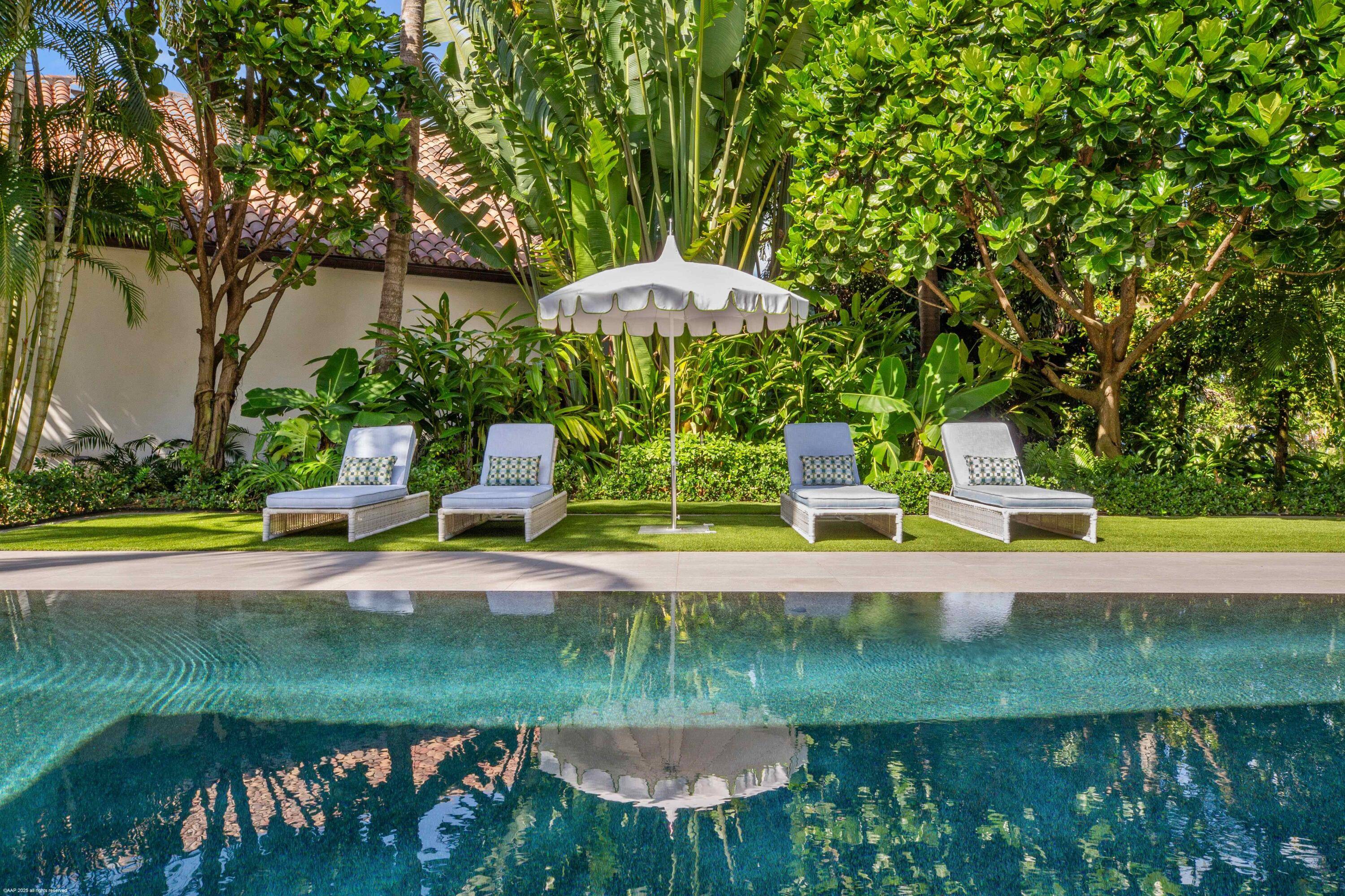Experience luxury living at its finest in this stunning seasonal rental, located in the prestigious Equestrian Club Estates, just a quick golf cart ride from the show grounds.