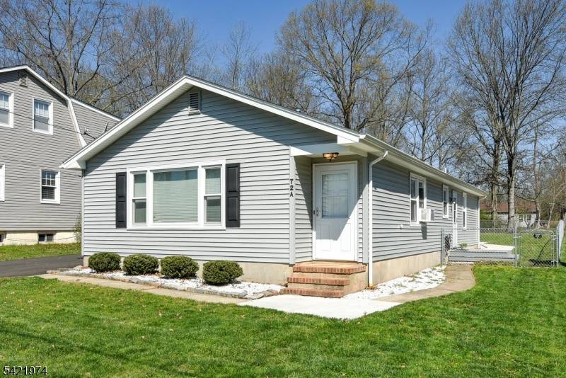 Charming ranch featuring spacious rooms and convenient one floor living.