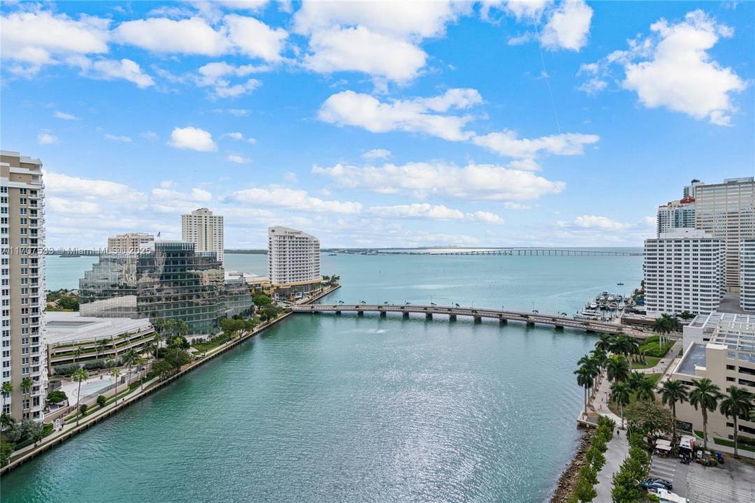 Unique opportunity Available For Sale with stunning 180 views of Biscayne Bay, skyline, and resort style pool from this renovated corner 3BR 2BA condo at ICON BRICKELL Tower II.