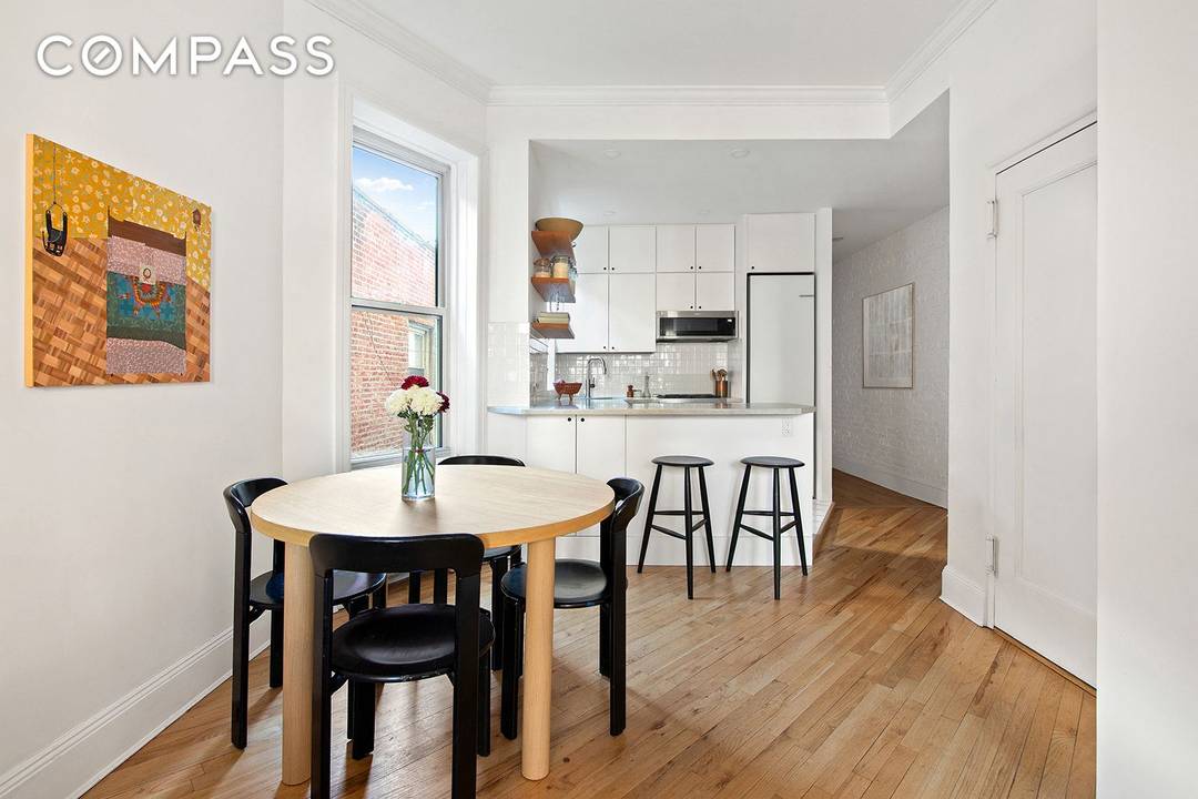 Experience this sun drenched two bedroom, one bathroom co op in the heart of Carroll Gardens, where natural light pours in through eight windows with north, south, and east exposures, ...