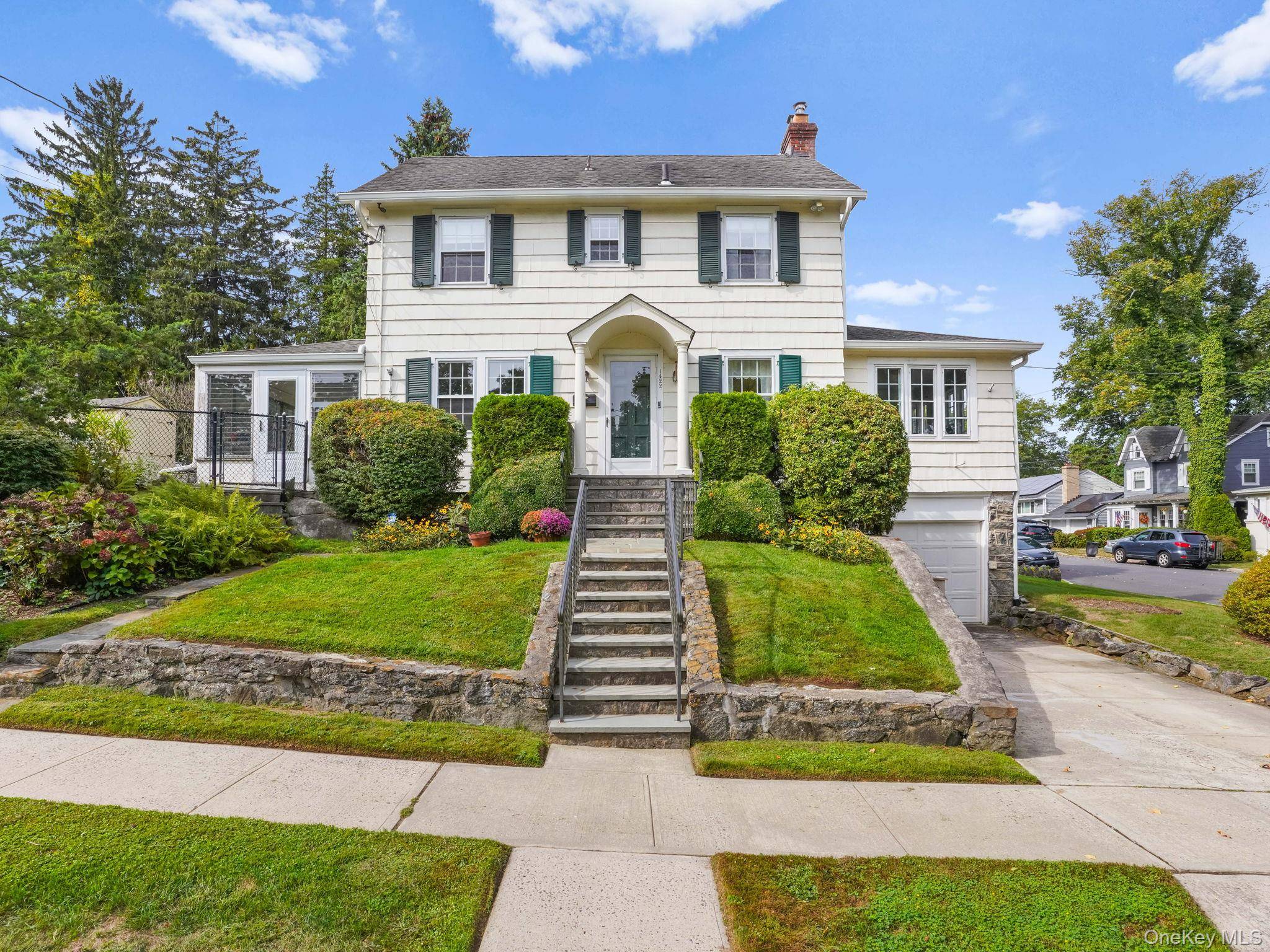 Welcome to this charming home in Mamaroneck, perfectly set on a sunny corner lot in the sought after Harbor Heights neighborhood.