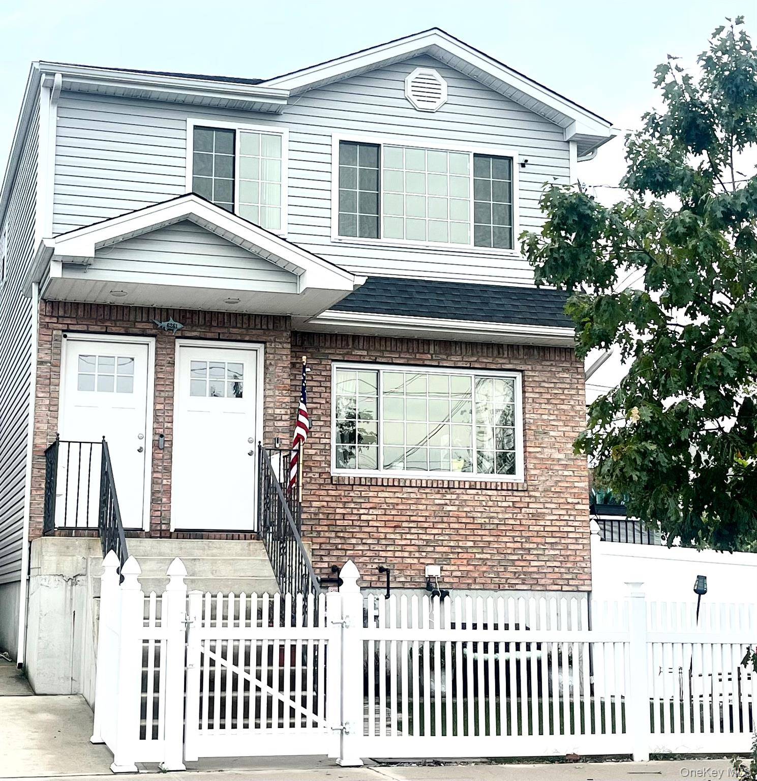 Beautifully designed two family home built in 2019 with rare waterfront views.