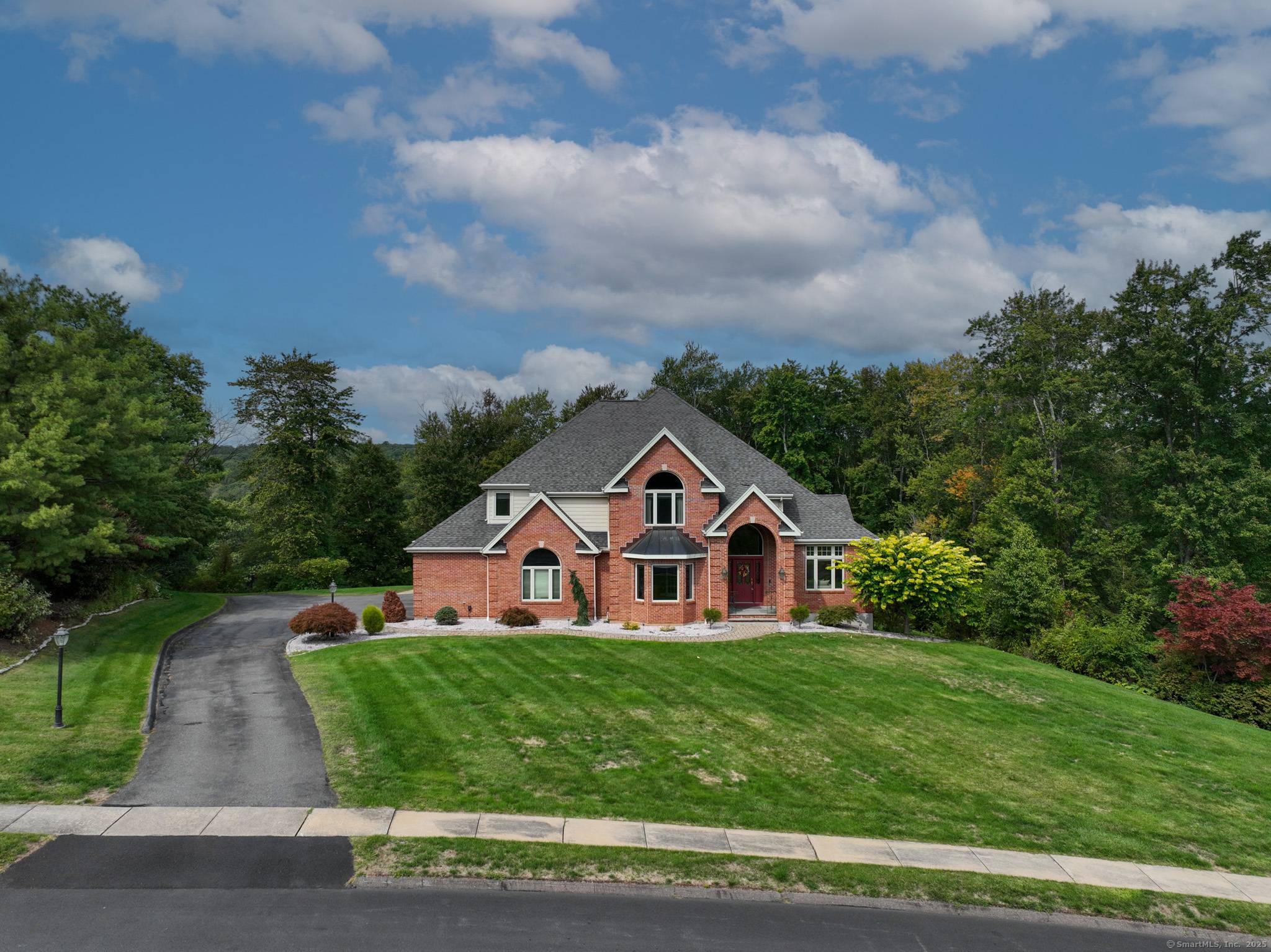 This exquisite custom home, crafted by the acclaimed Lawlor Builders in 2001, is a masterpiece of luxury and design.