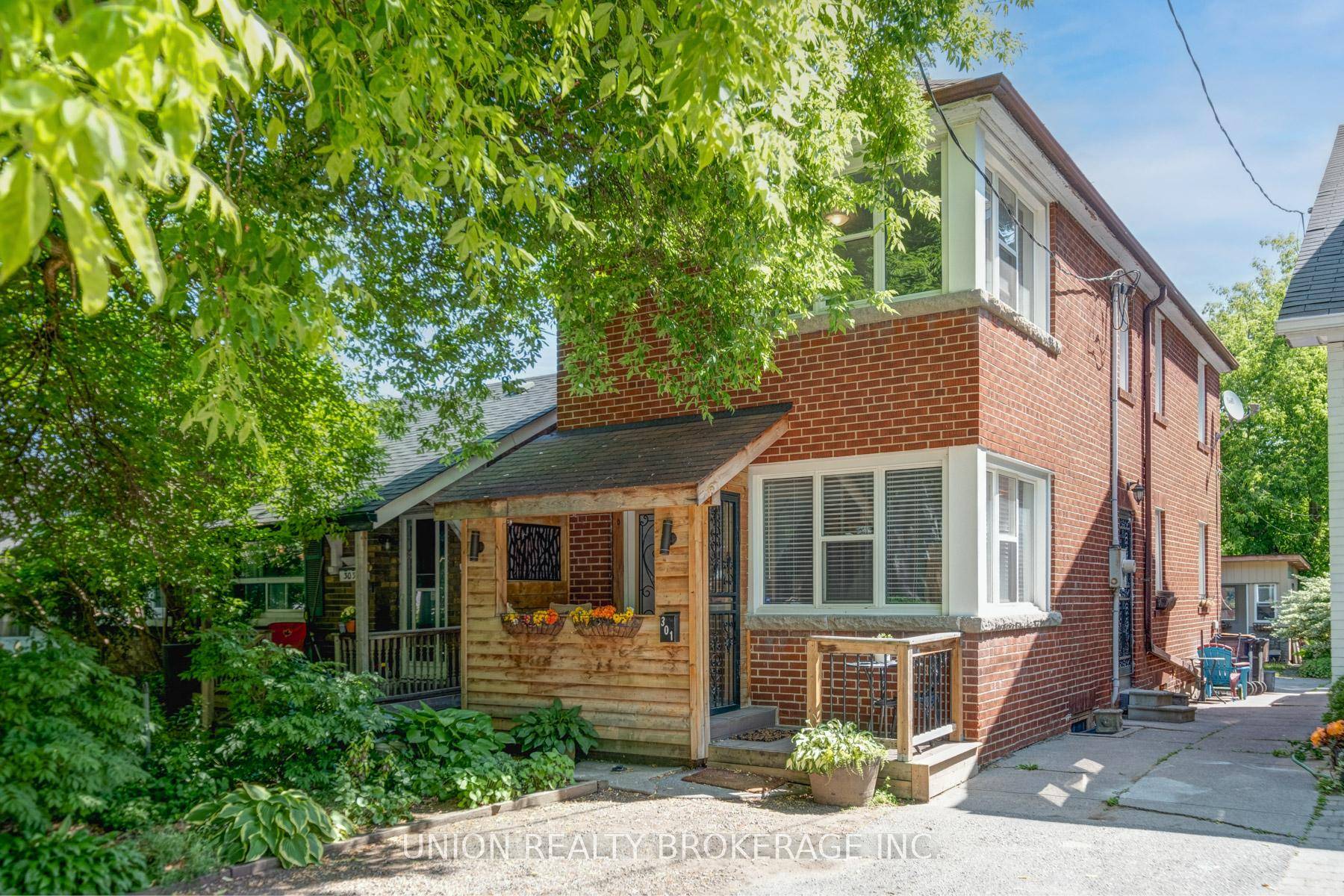 Solid brick detached home in the Upper Beach.