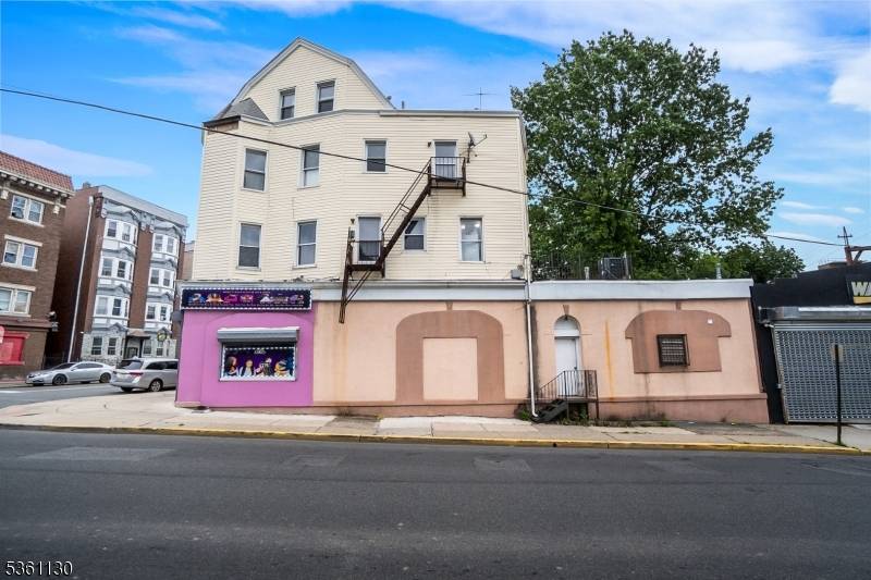 Discover this beautifully renovated mixed use building in the heart of East Orange, a prime opportunity for savvy investors seeking robust rental income and long term value.