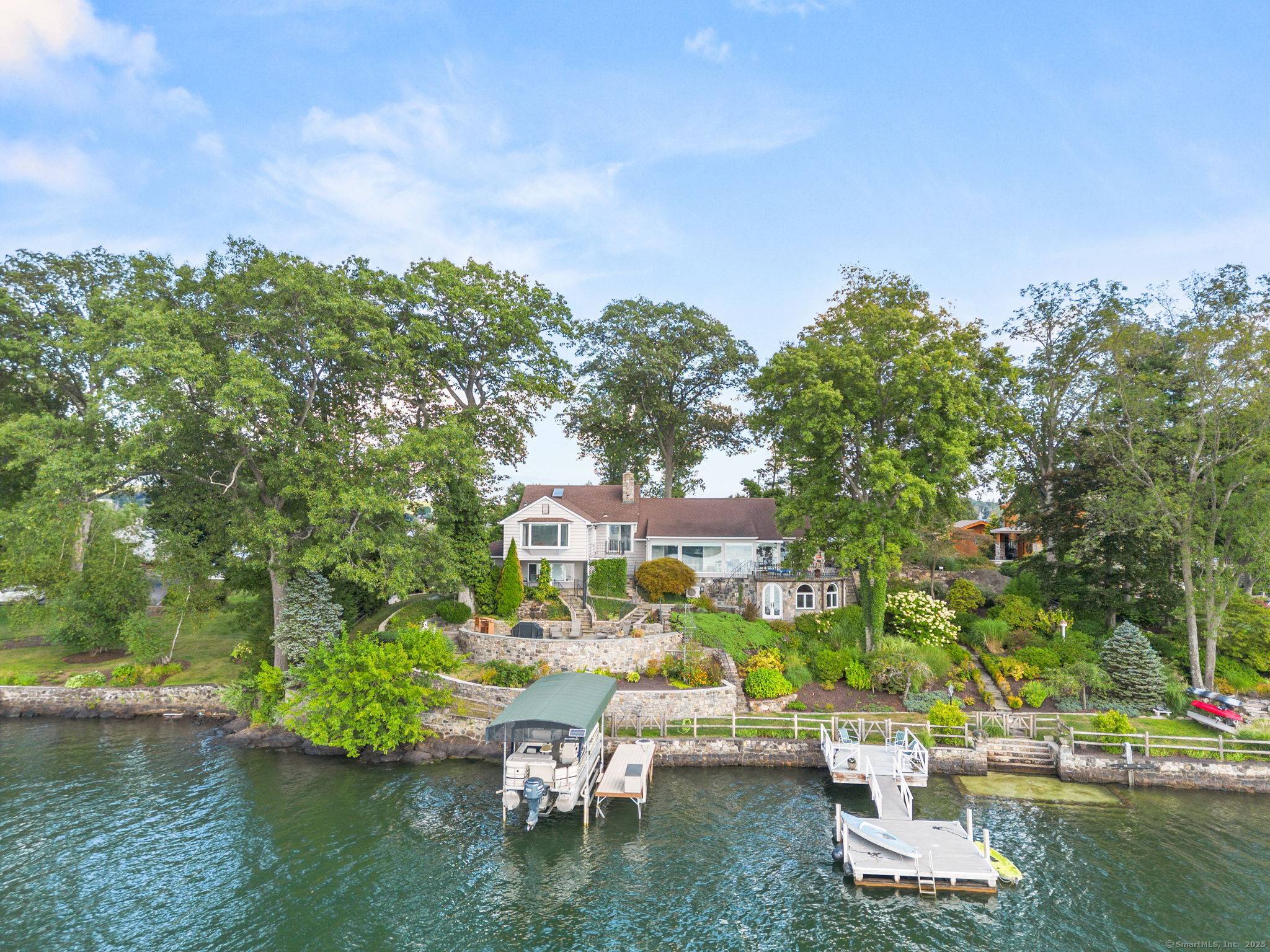 Exceptional Candlewood Isle waterfront home with panoramic lake views.