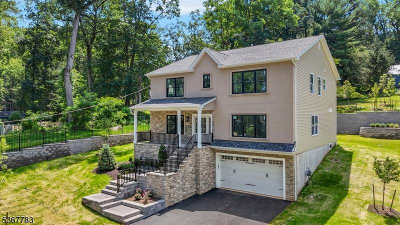Spectacular custom new construction home in the most sought after Whispering Hills neighborhood of South Plainfield.