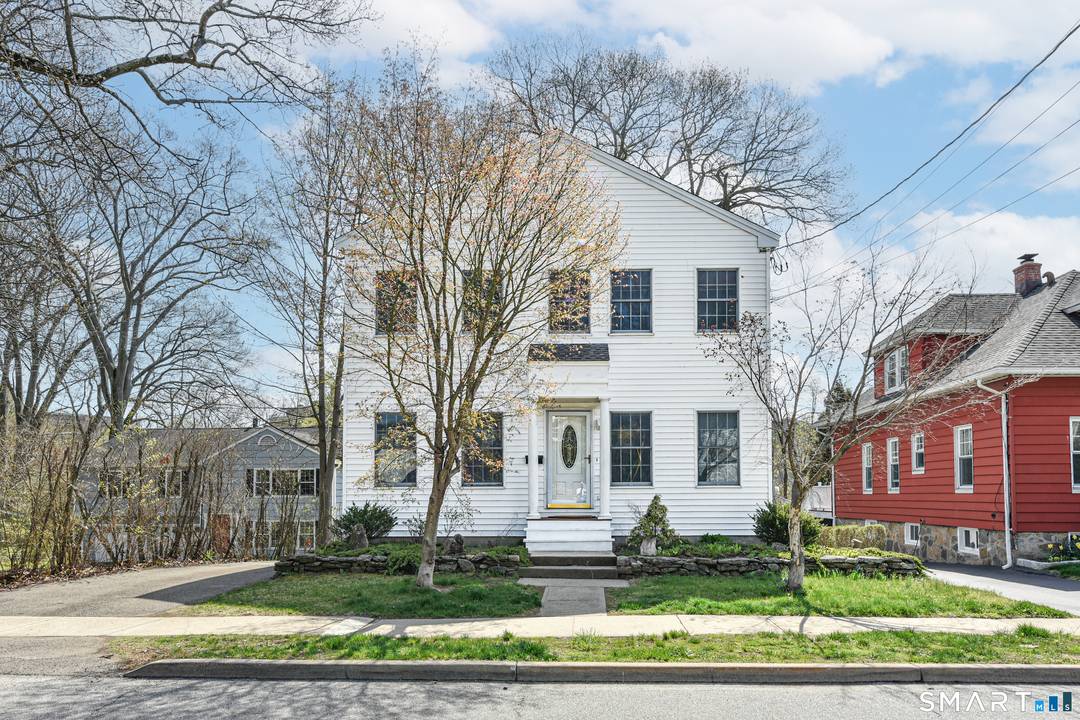 Welcome to this beautifully maintained three bedroom, two full bath, one half bath home offering three levels of spacious living.