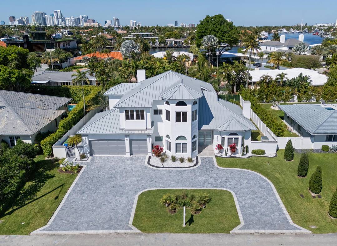 This 4 bedroom and 3 bath home is located in the gated community of Sunrise Intracoastal.
