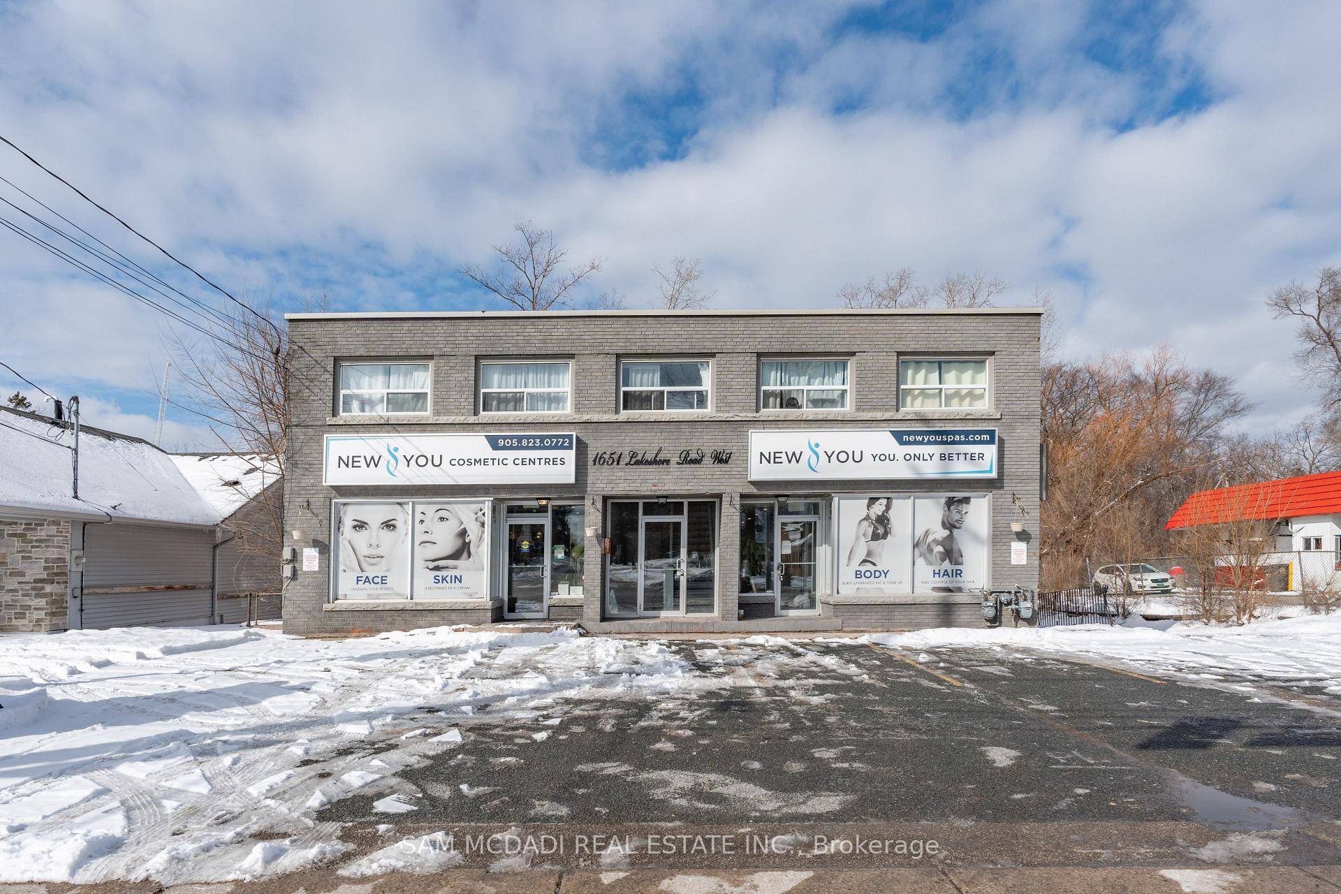 Seize this rare opportunity to own this highly versatile commercial property in the renowned Clarkson community.