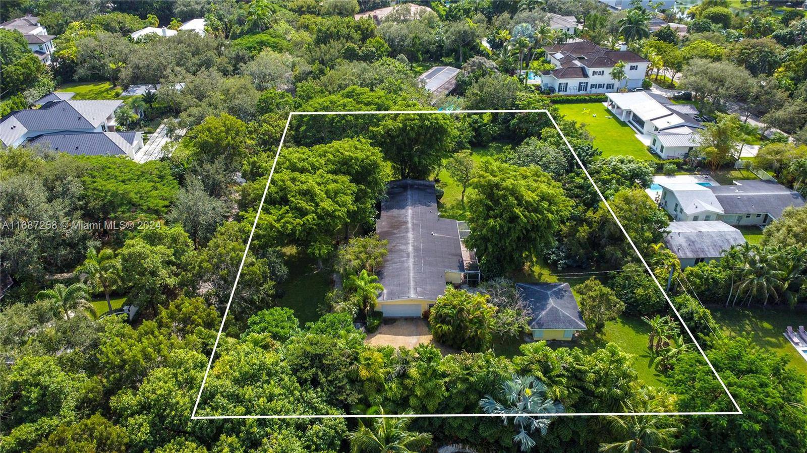 Nestled on a serene, tree lined side street in the heart of Pinecrest, this one acre lot with the original 1950's home offers the perfect opportunity to remodel or build ...