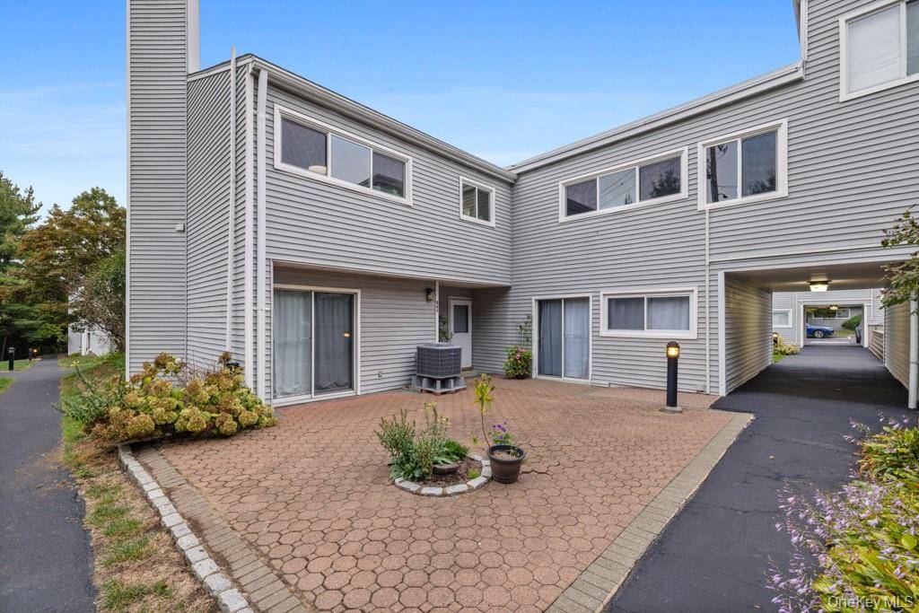 Rare 3 bedroom, 2 bath, first floor unit in sought after Bedford Mews.