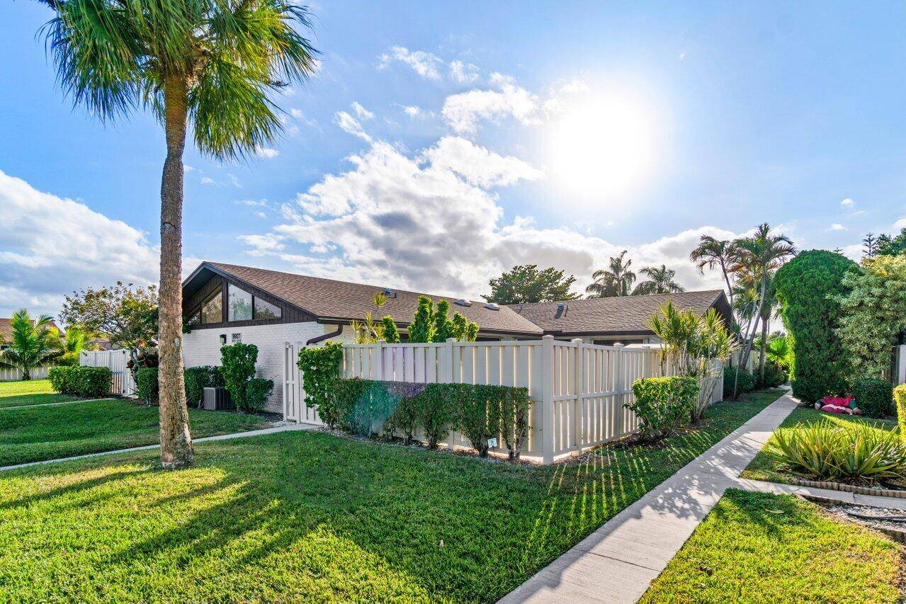 Light, bright, and spacious 3 2 with large private courtyard in beautiful Boca Gardens.