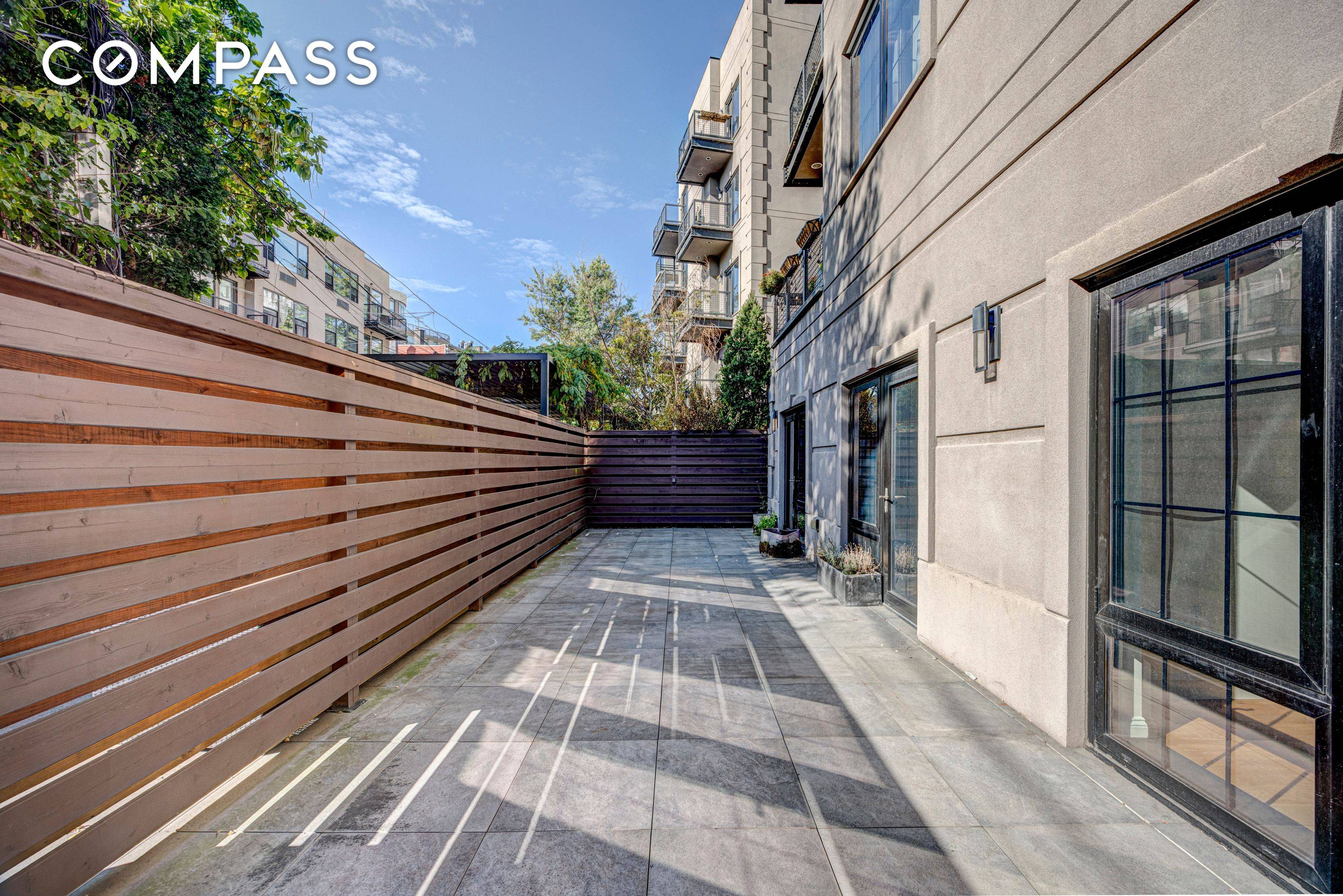 A Rare Garden Residence with 10' Ceilings, Deeded Parking and Storage, Private Patio, and 29 month taxes.