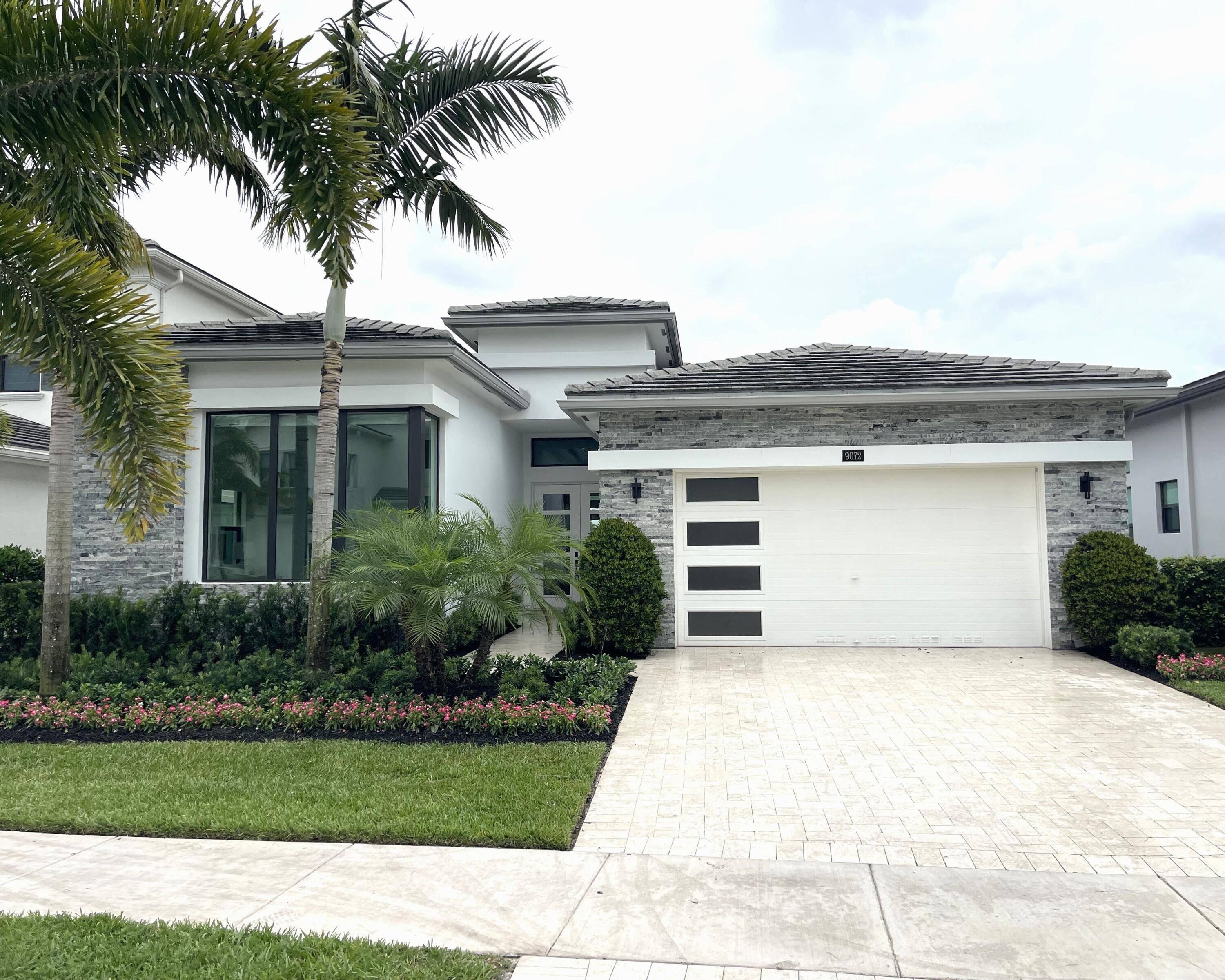 Better than brand new ! Beautiful lake view from the oversized backyard and pool area.