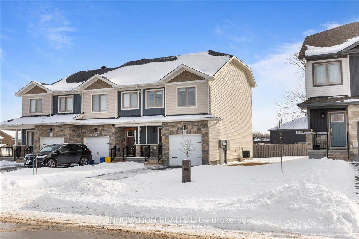 This stylish and affordable three story END UNIT townhome is the perfect fit for first time buyers !