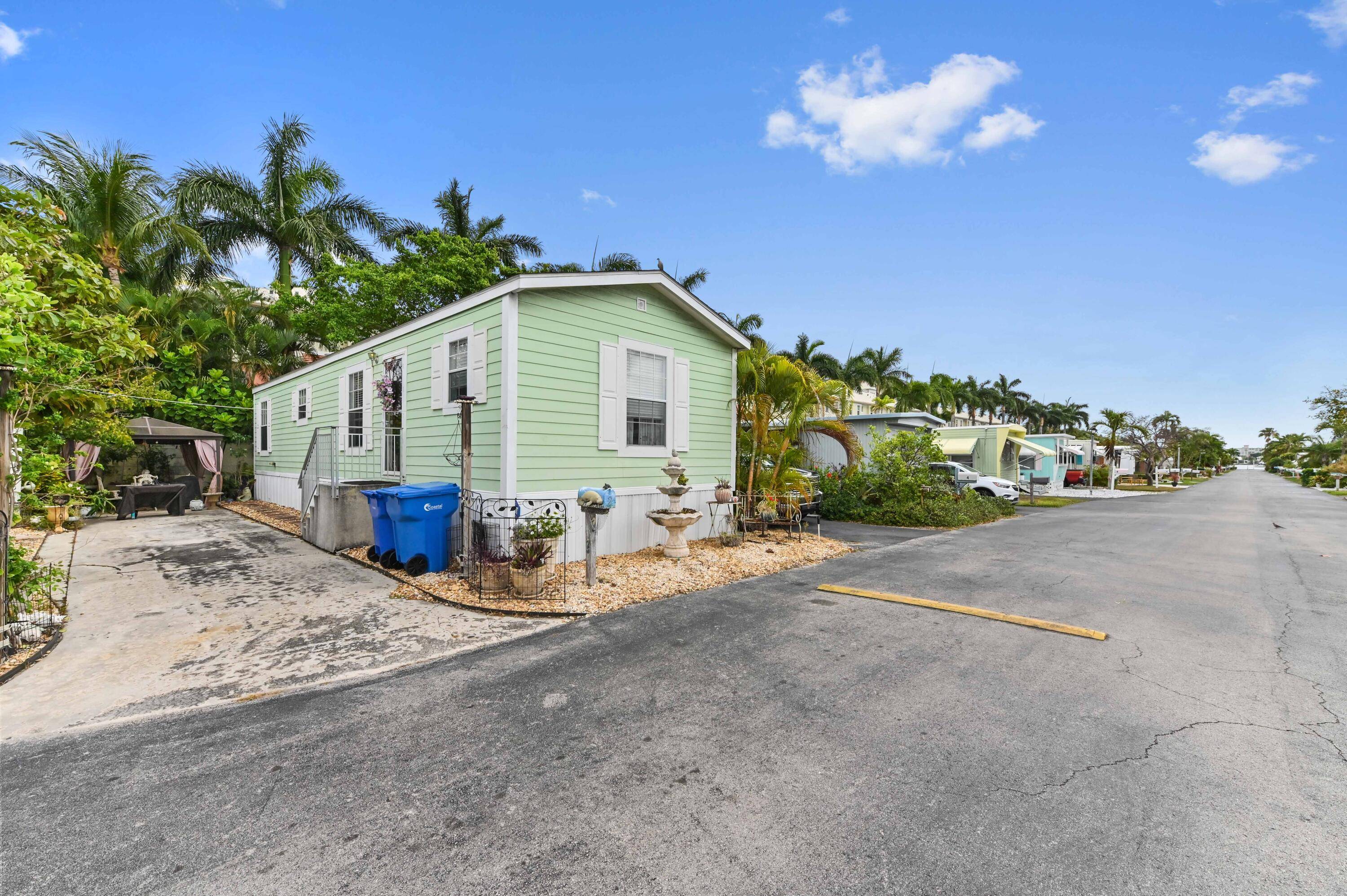 Welcome to this charming 2 bedroom, 2 bathroom mobile home nestled in a serene 55 intracoastal community.
