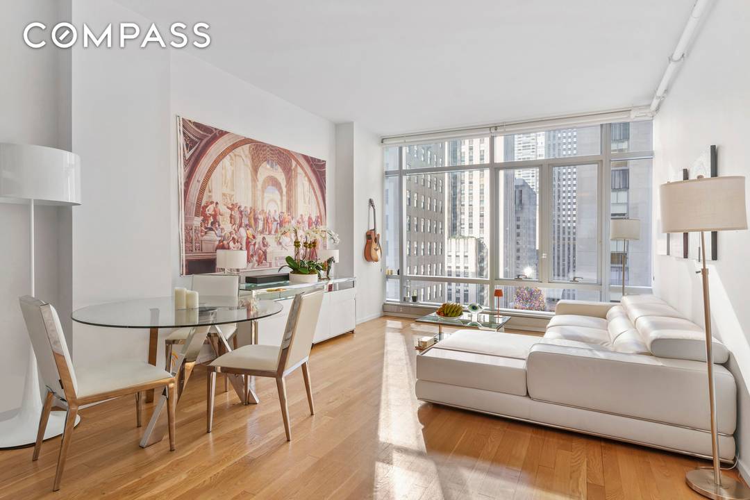 Condo Doorman Washer dryer in unit Investor friendly building Direct views of Rockefeller Plaza Direct iconic views of Rockefeller Plaza from one of the largest one bedroom lines at The ...