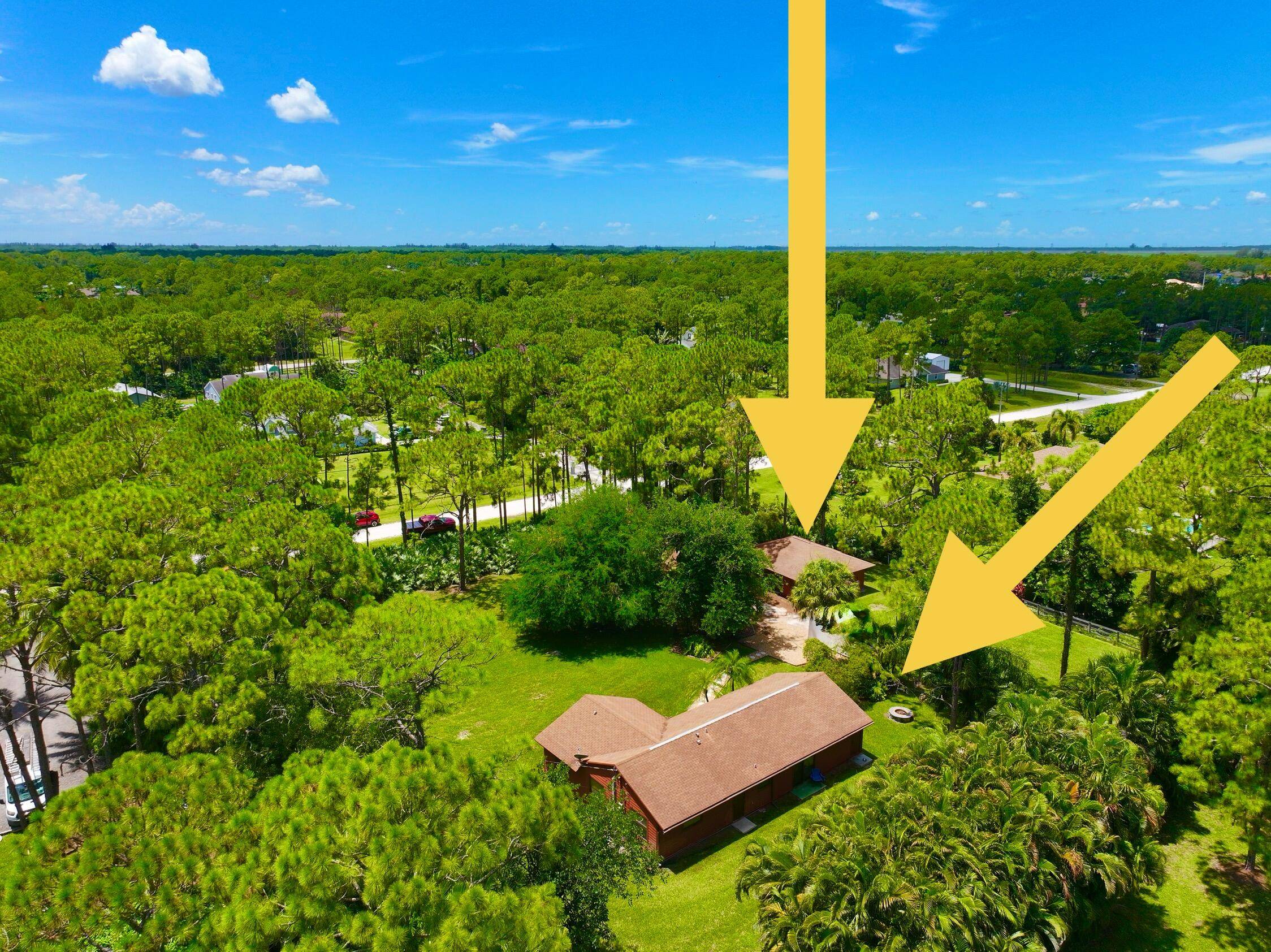 EXTREME PRIVACY NO VIEW OF NEIGHBORS CALLING ALL LANDSCAPERS, BUSINESS OWNERS, CAR COLLECTORS, 2 FOR THE PRICE OF 1.