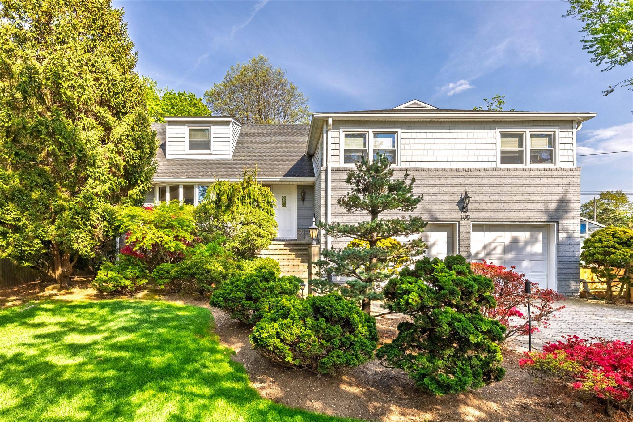 Calling All Arborists and Horticulturist This Beautiful Split Level Home Boasts a Little Over 1 2 ACRE.