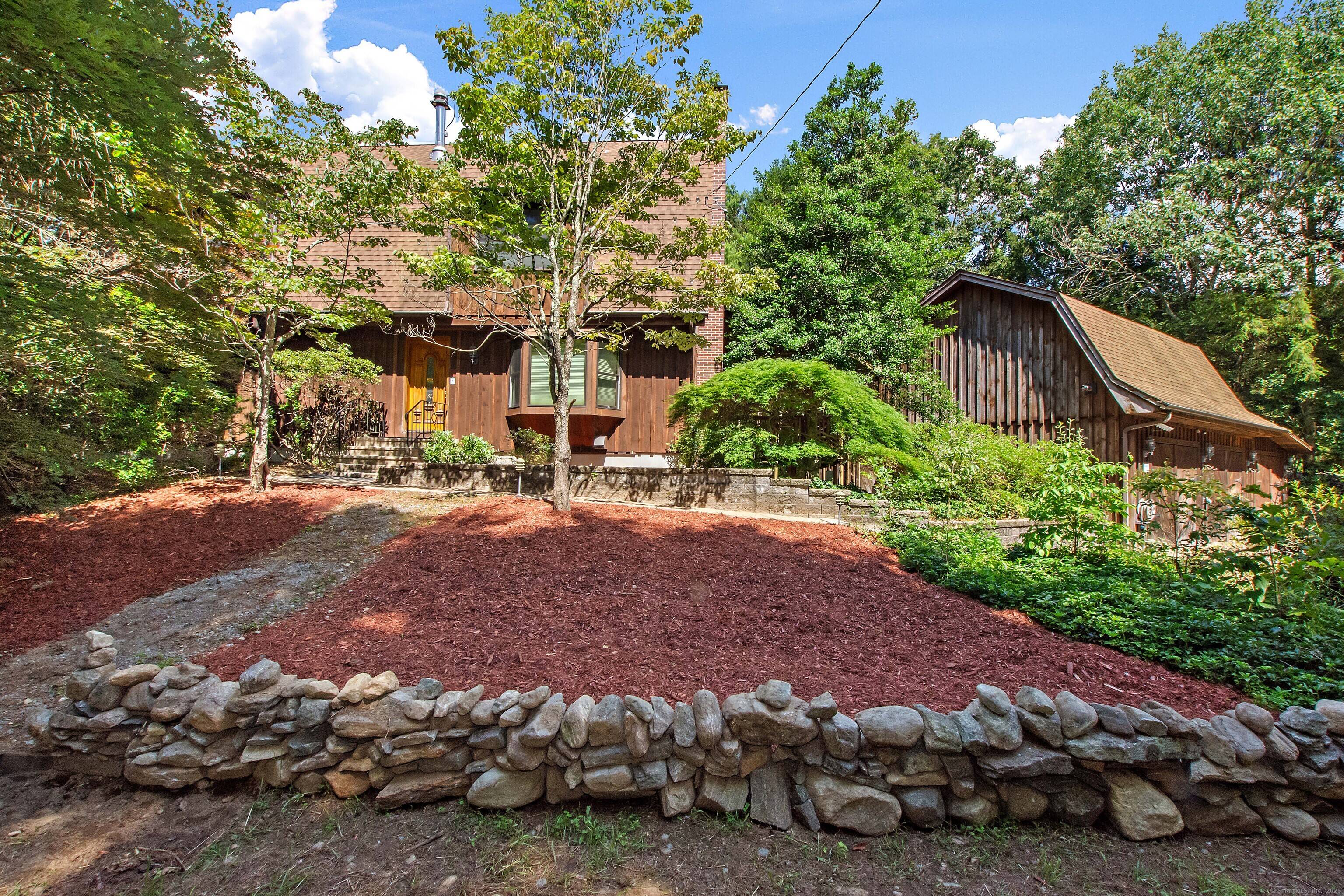 Discover this UNIQUE 5 Bedroom, 4 1 2 Bath Gambrel Colonial nestled on 1.