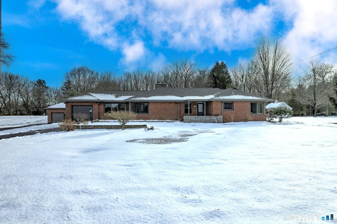 Welcome to 53 Geer Street in Cromwell an exquisite brick ranch that has been completely updated with refined finishes and thoughtful design throughout.