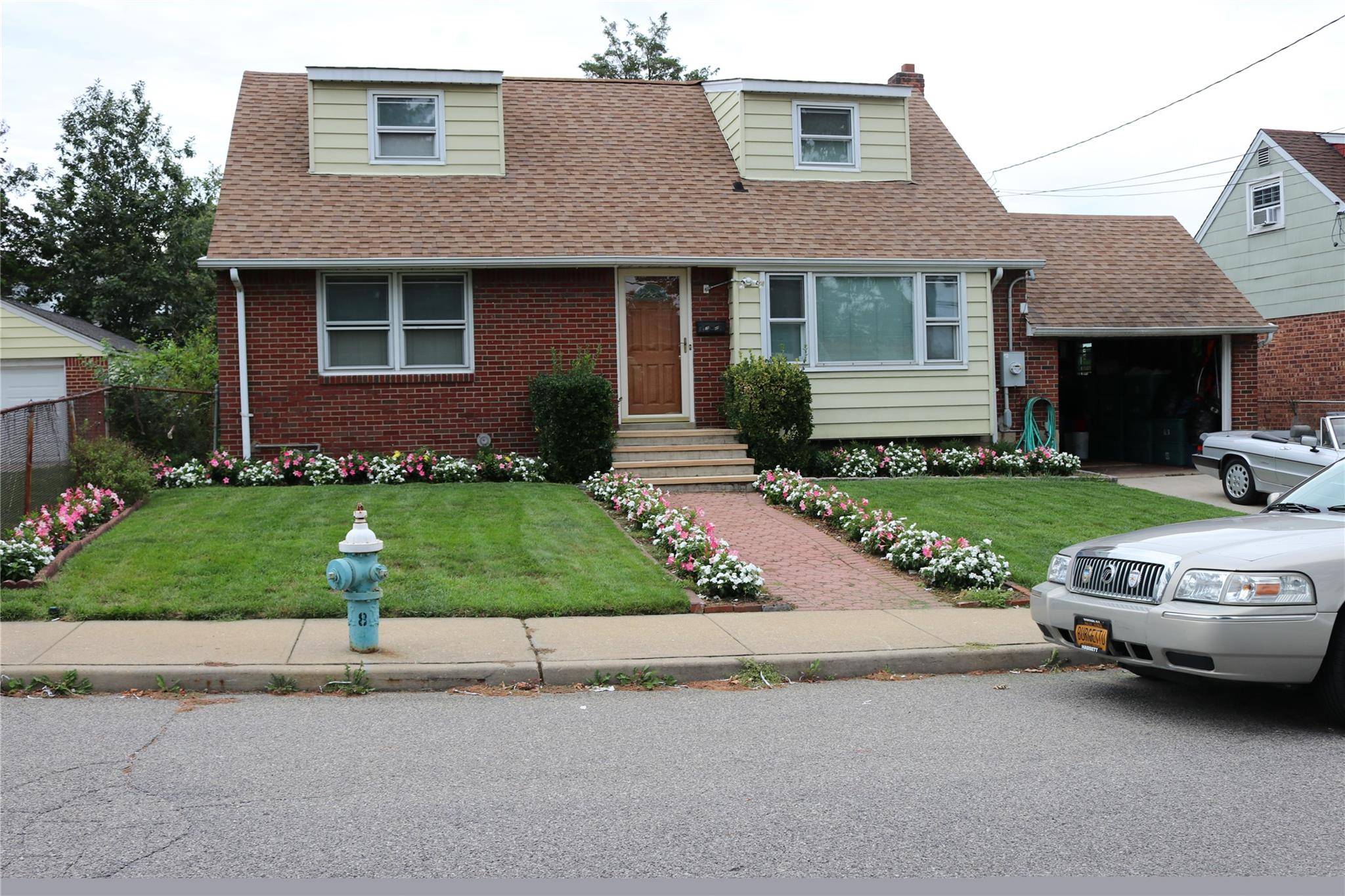 Well Maintained 4 bedroom, 2 Baths Cape Cod Home, Located in the heart of Elmont.
