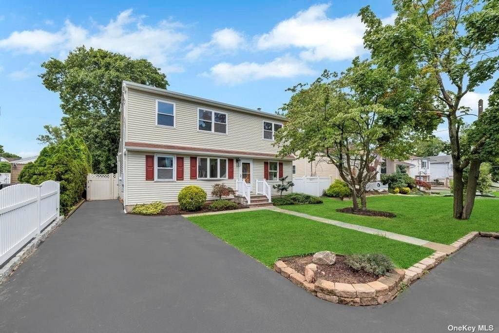 Welcome to this newly renovated colonial home located in the heart of Lindenhurst Village.