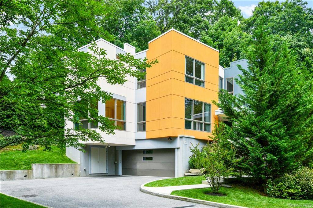 Welcome to this one of a kind architectural gem that blends artful design into a tranquil park like setting.