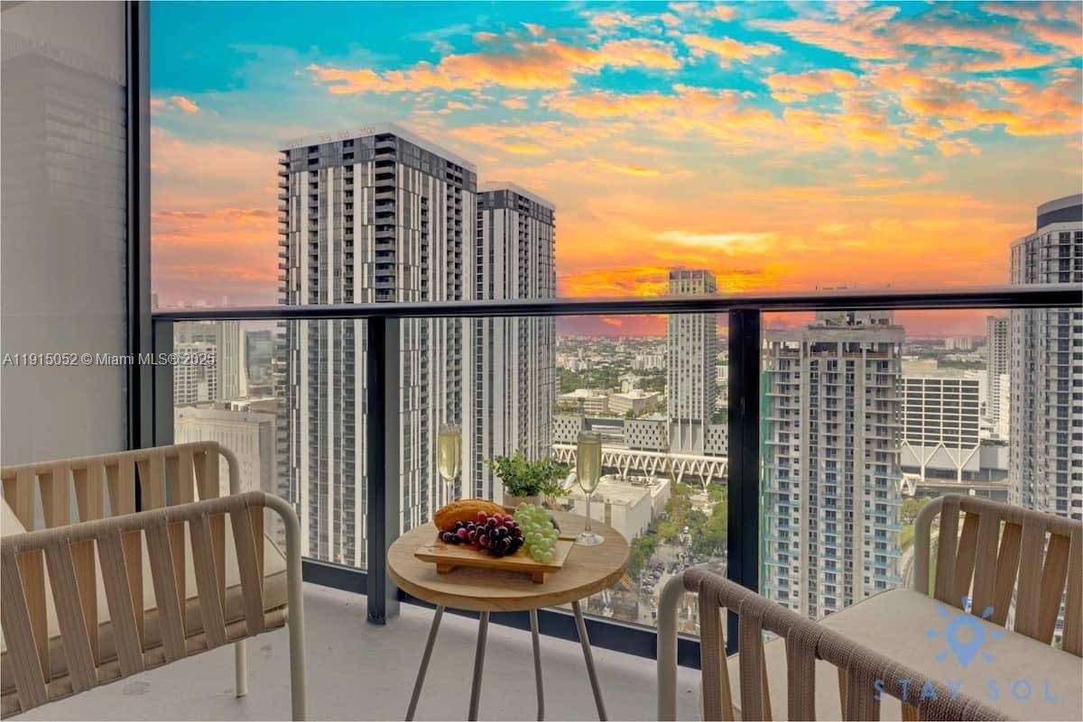 Experience elevated living in this stunning corner unit located in an exclusive 52 story luxury tower in the heart of Downtown Miami.