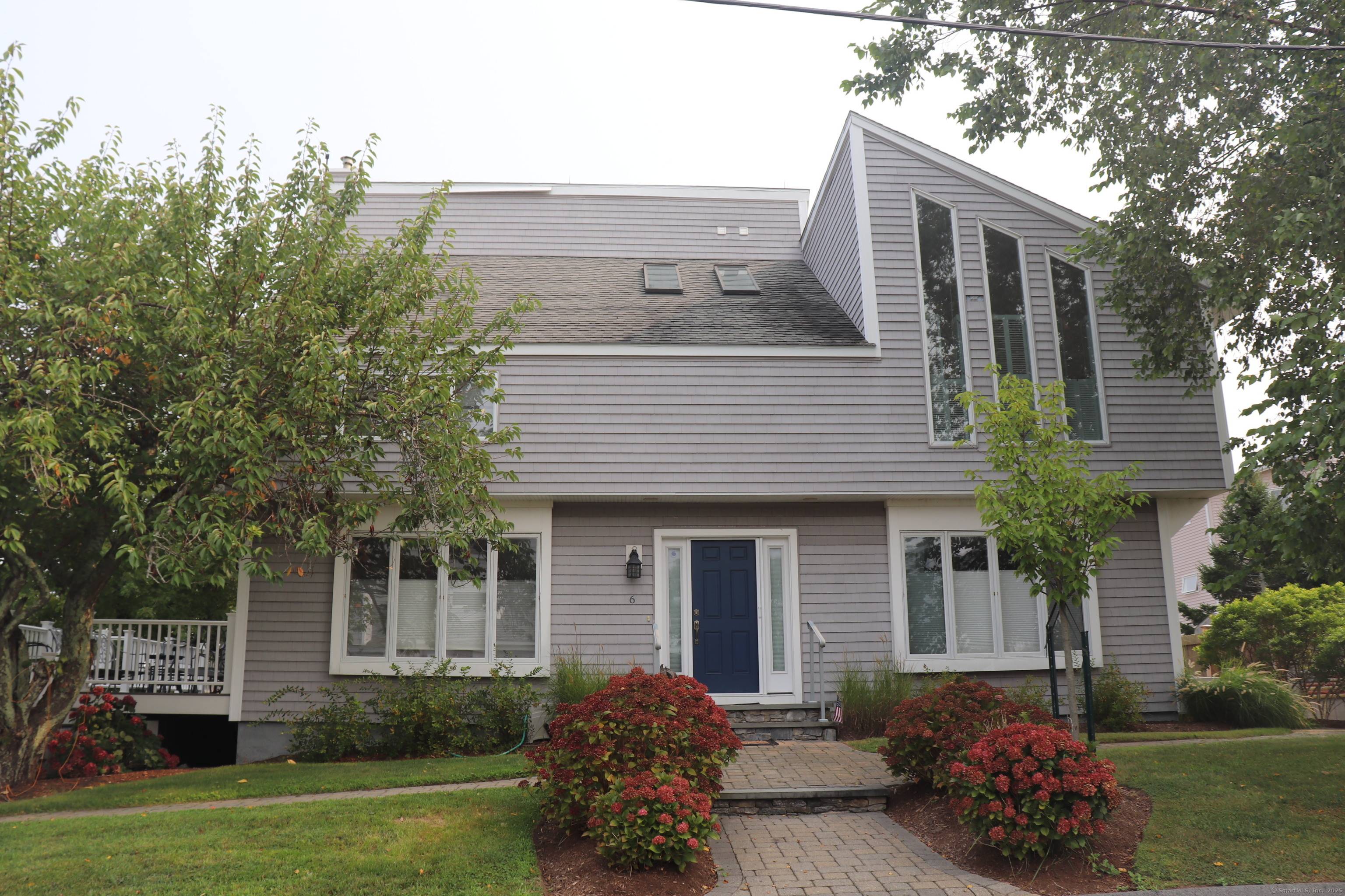 Stunning 3 bedroom contemporary with views of Pilots Point Marina and short walk to private Association beach !
