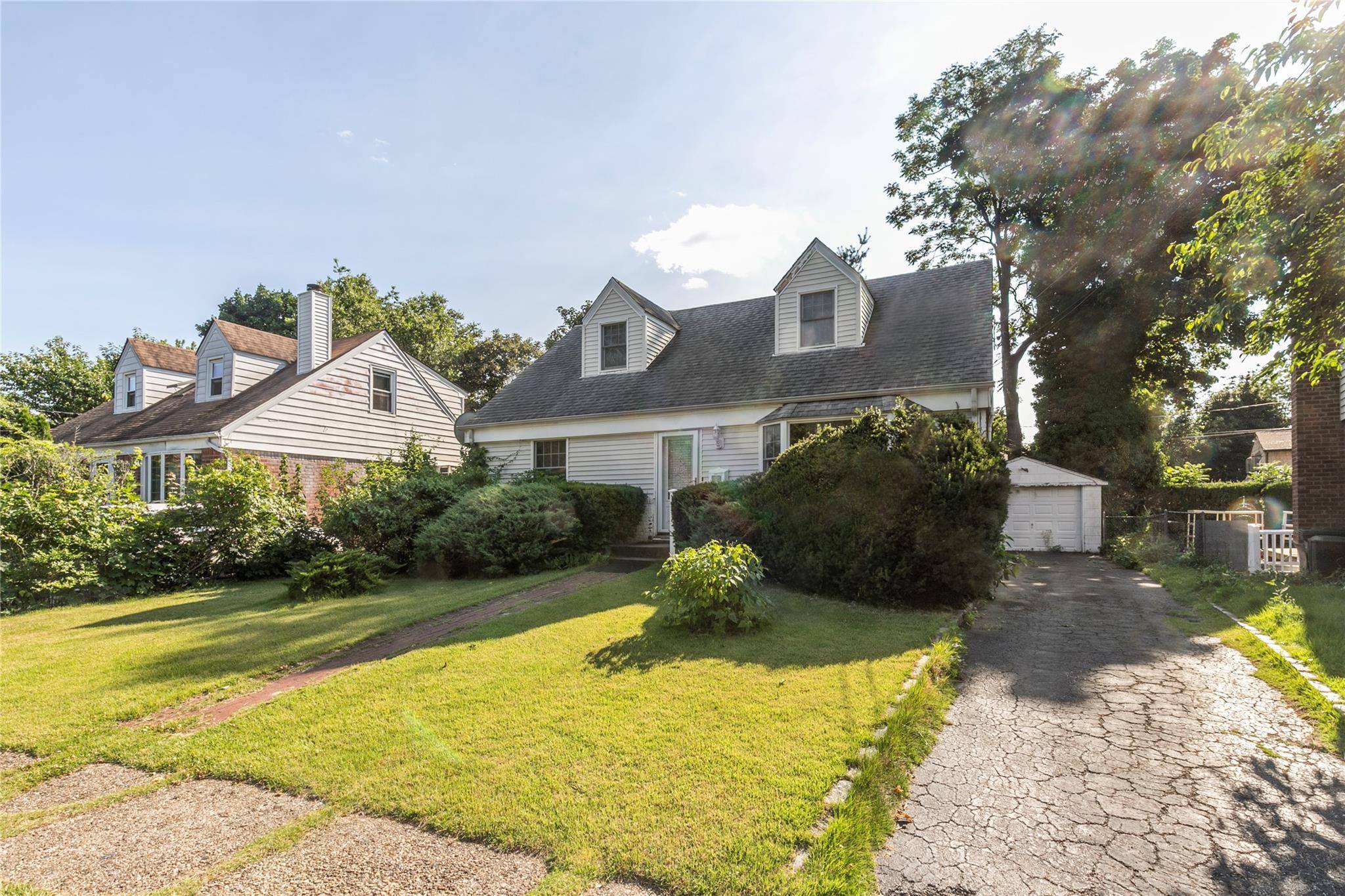 LOCATION ! LOCATION ! DESIRABLE QUIET CUL DE SAC in the Village of Great Neck.