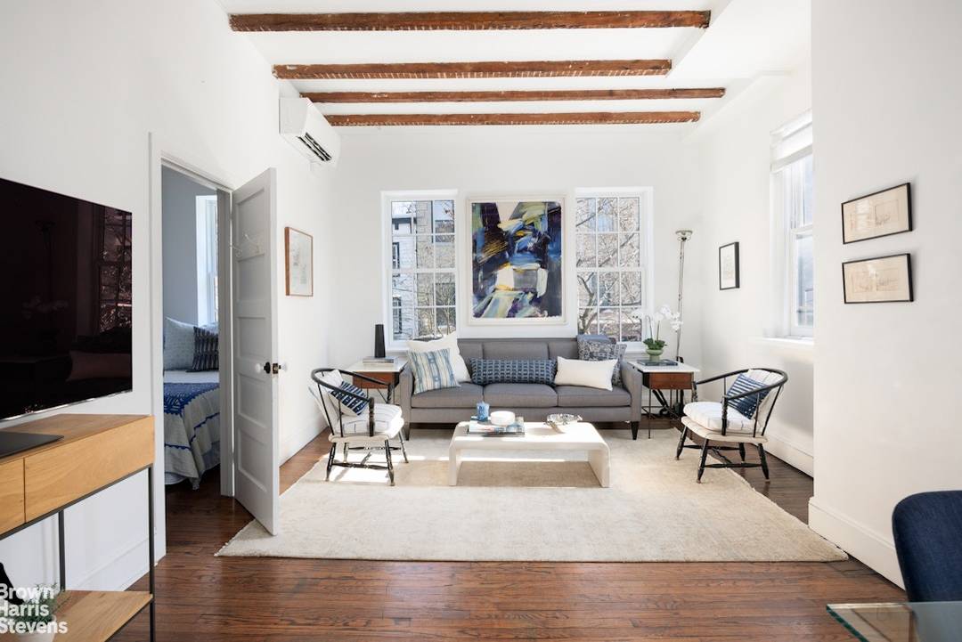 Built in Greek revival style during the early 1800s, The Landmark Preservation Commission recognized this row of Vinegar Hill townhouses as a protected Historic Landmark District in 1997.