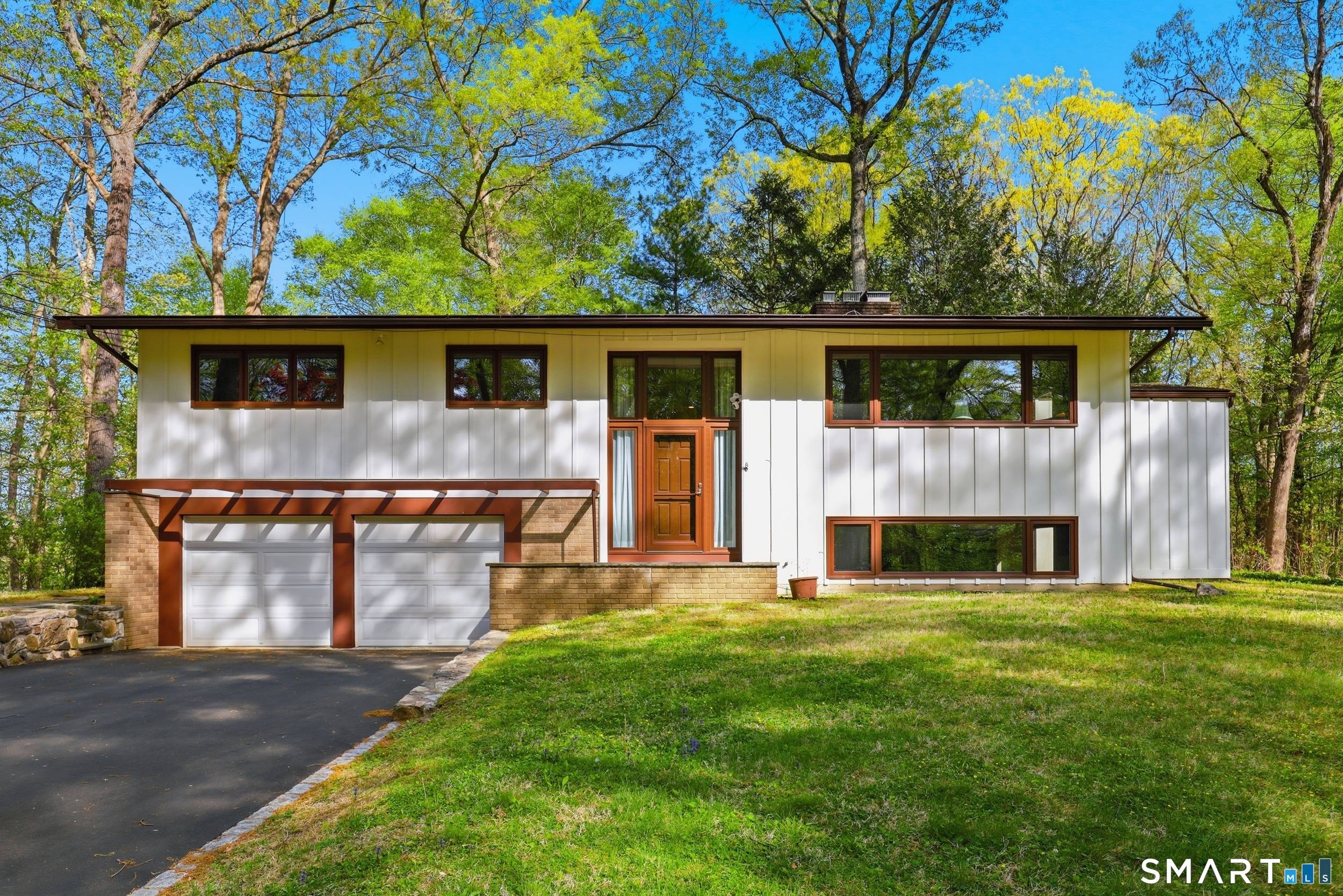 Nestled on a private one acre setting in sought after North Stamford, this four bedroom raised ranch offers the perfect balance of space, comfort, and privacy just 10 minutes from ...
