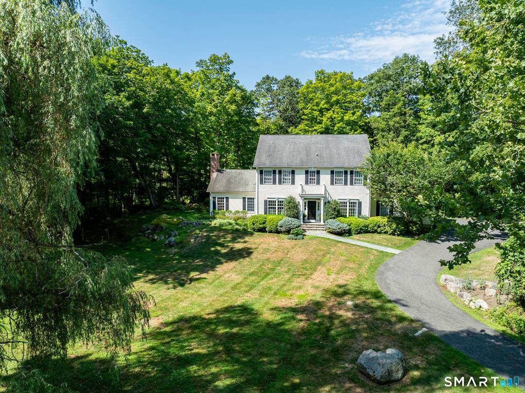 A stunning colonial in highly desirable Ridgefield, this light filled residence offers meticulously designed living space set on 1.