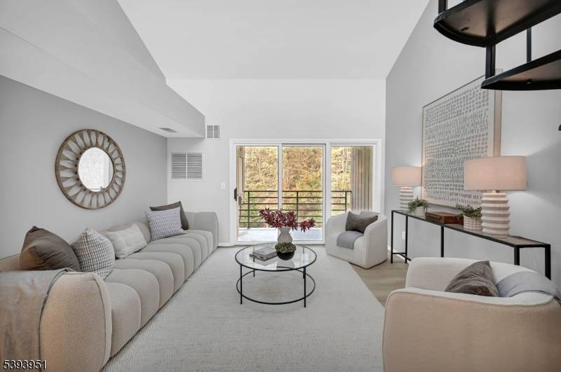 Modern luxury meets convenience in this stunning, fully renovated top to bottom multi level condo just minutes from downtown Morristown !