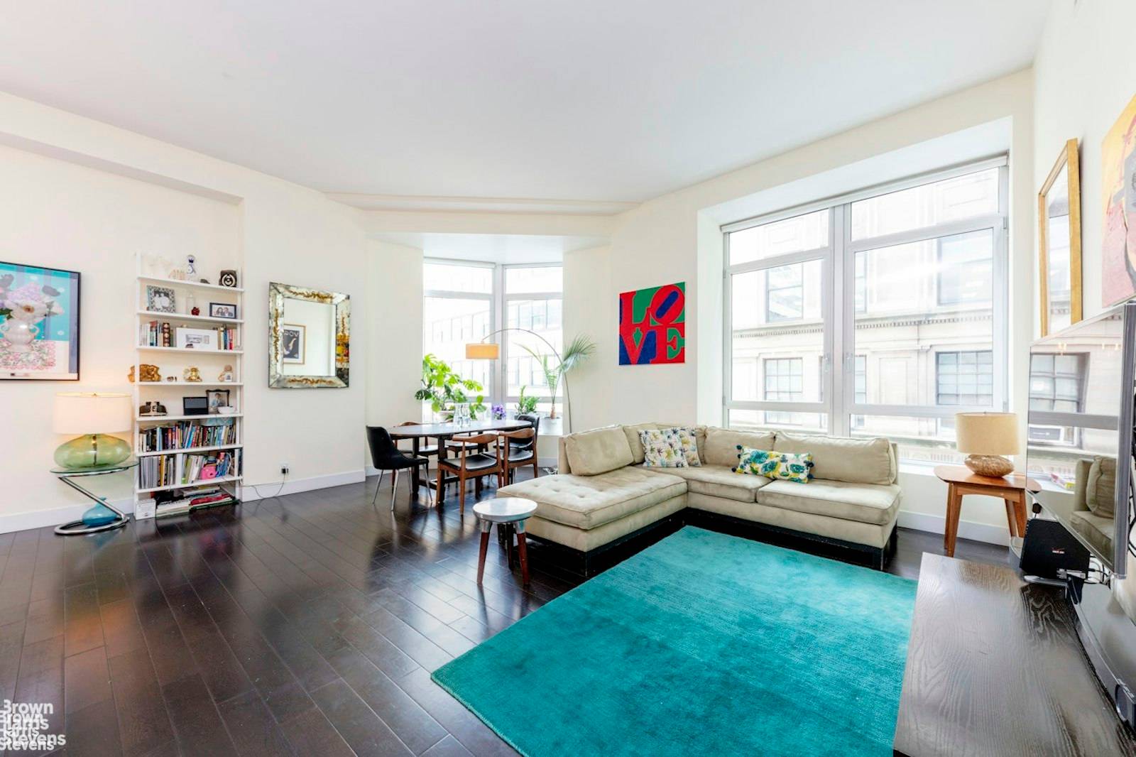 Soaring ceilings and expansive spaces define this modern, loft like corner 2 bed, 2 bath home.