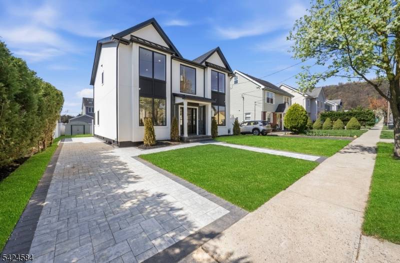 Experience modern living in this newly constructed home built over a solid existing foundation, blending fresh design with enduring quality.