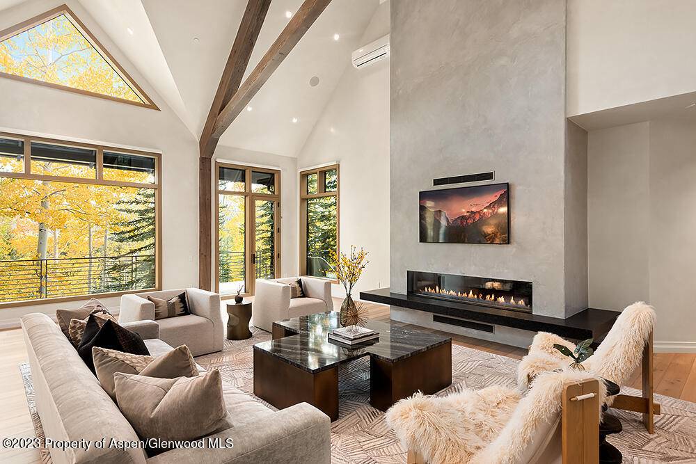 Simply Wow ! ! Come see this impressive 8, 673 sq ft residence perched on over half an acre adjacent to the Maroon Creek Club.