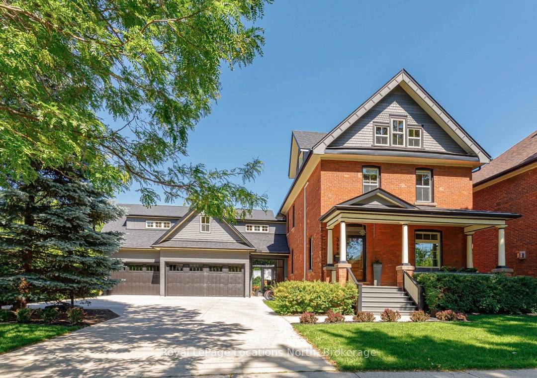Welcome to this stunning red brick home in downtown Collingwood, seamlessly blending classic charm with contemporary elegance.