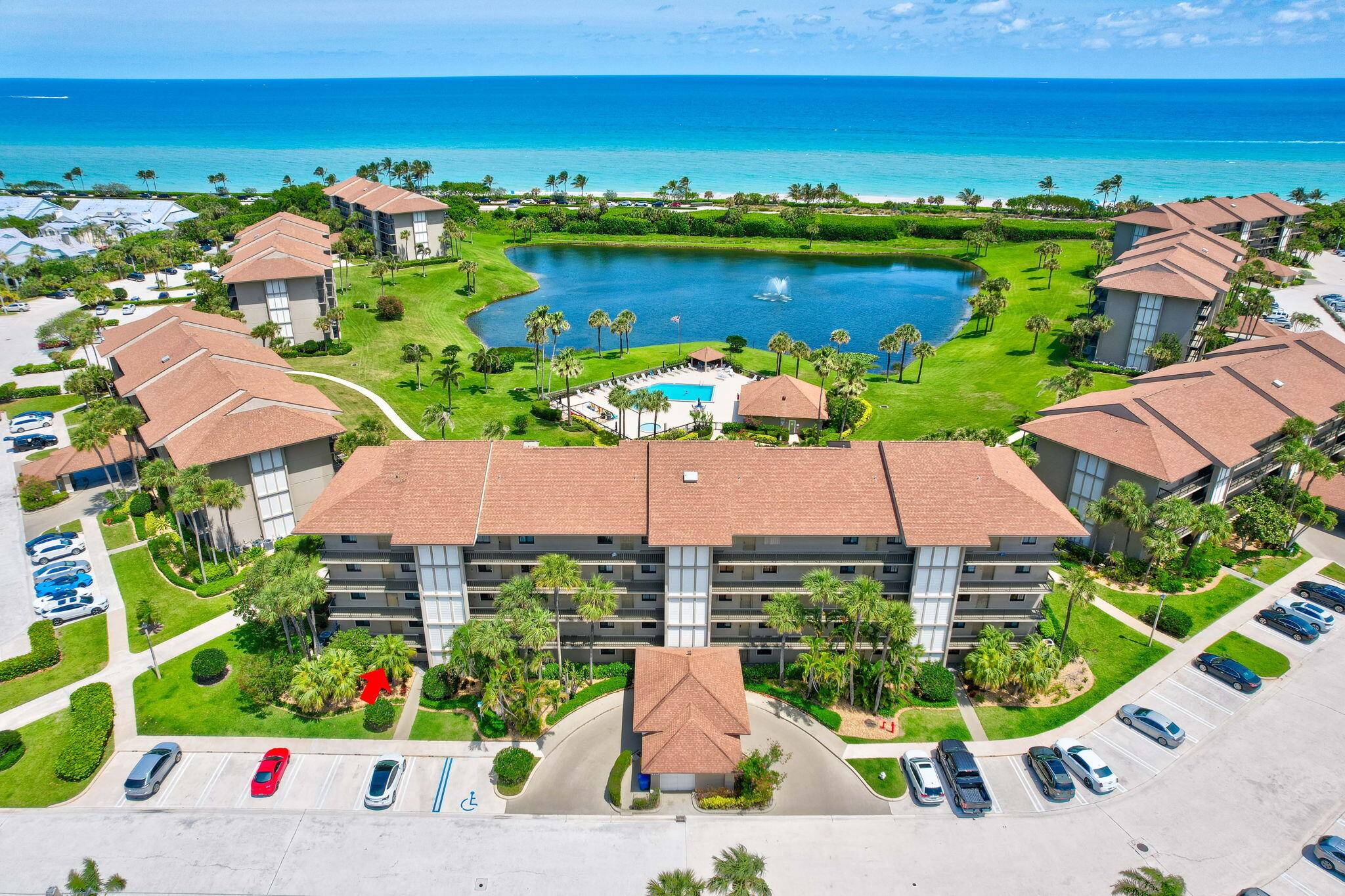 East facing corner unit only steps to the turquoise ocean and white sand beaches.