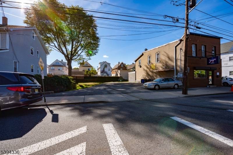 142 146 Divisions Ave Discover an exceptional investment opportunity at 142 Division Ave, Garfield.