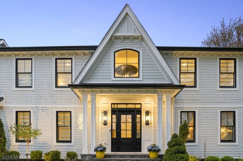 Welcome to this stunning, architect designed luxury home in the prestigious Hartshorn section of Short Hills.