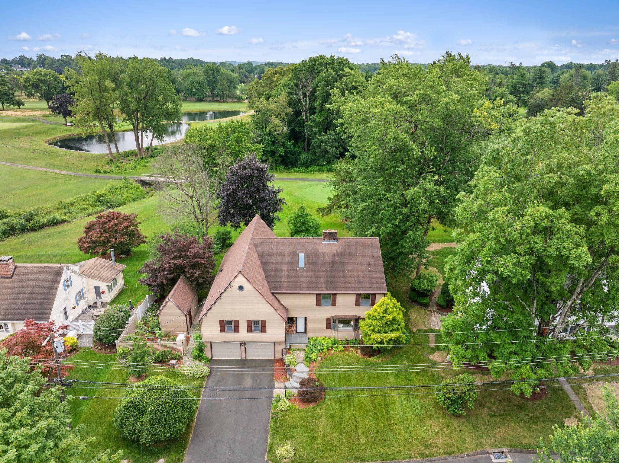 Discover the ultimate in space, style, and scenery in this expansive split level home perfectly positioned on the edge of Rockledge Golf Course.