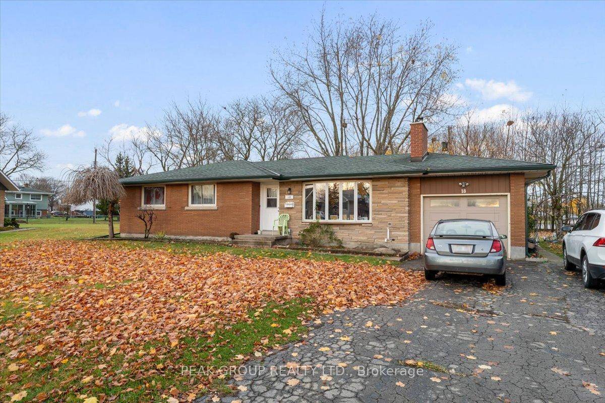 Welcome to 18 Karen Crescent, a charming brick bungalow nestled on a peaceful crescent in one of Welland's most desirable neighborhoods.