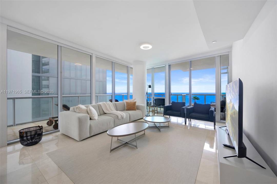 This stunning residence in Sunny Isles Beach offers 3 spacious bedrooms and 3.