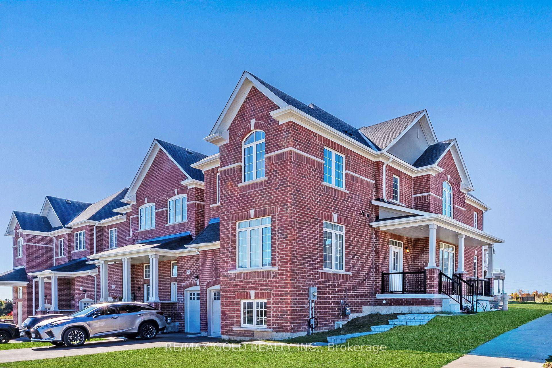 Spacious End Unit Freehold Townhome with Lookout Basement !