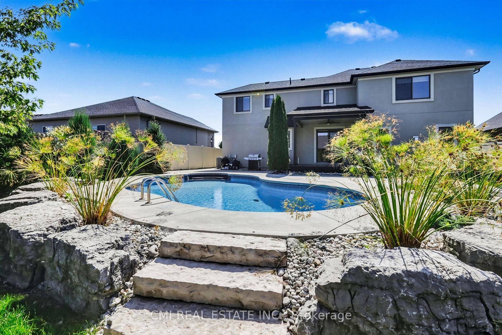 Welcome to Your Lakeshore Dream Home with a Backyard Oasis !